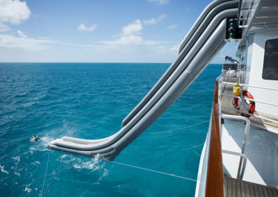 suri adventure charter yacht freestyle inflatable cruiser water slide 11m