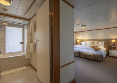 suri-adventure-yacht-charter-teak-stateroom-guest-accommodations